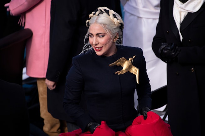 UNITED STATES - January 20: Lady Gaga departs from a podium after signing the national anthem during...