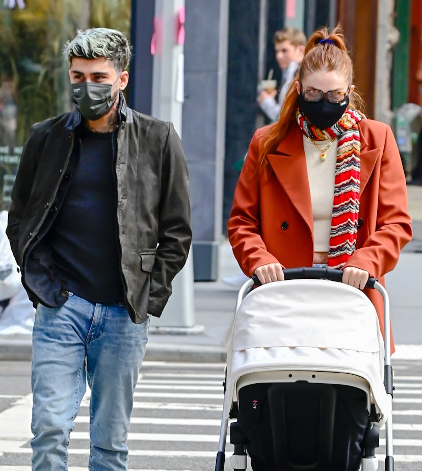 NEW YORK, NY - MARCH 25:  Zayn Malik and Gigi Hadid take baby Khai on a walk to lunch at The Smil on...