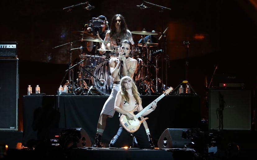 PARIS, FRANCE - SEPTEMBER 25: (Back to Front) Ethan Torchio  Damiano David and Victoria De Angelis, ...