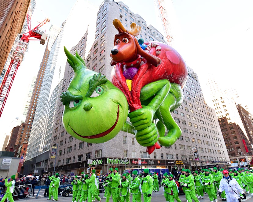 Image of a Grinch balloon float seen at the Annual Macy's Thanksgiving Day Parade in New York City.