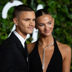 Romeo Beckham and Mia Regan attend The Fashion Awards 2021 
