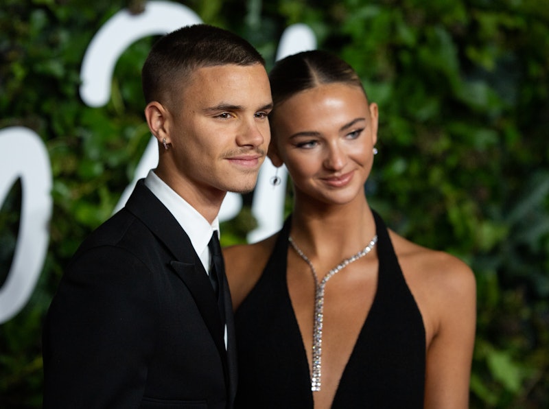 Romeo Beckham and Mia Regan attend The Fashion Awards 2021 