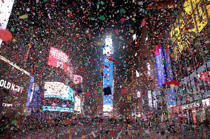 NEW YORK, NEW YORK - DECEMBER 31: The New Year's Eve ball drops in a mostly empty Times Square on D...