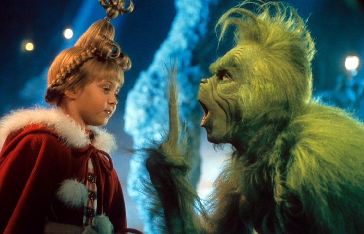 Taylor Momsen listening to Jim Carrey in a scene from the film 'How The Grinch Stole Christmas', 200...