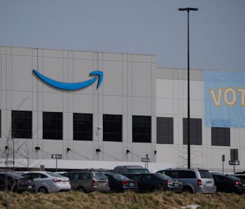 Vote signage hangs outside the Amazon.com, Inc. fulfillment center in Bessemer, Alabama on March 26,...