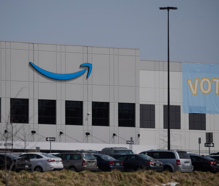 Vote signage hangs outside the Amazon.com, Inc. fulfillment center in Bessemer, Alabama on March 26,...