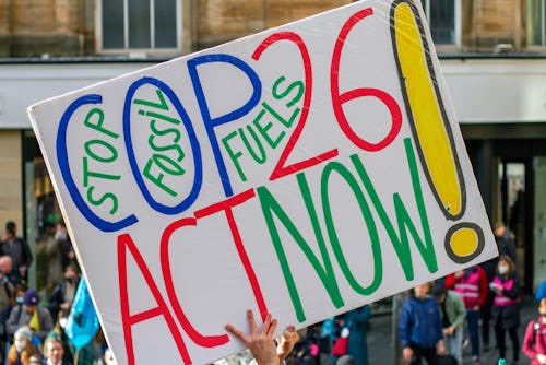 GLASGOW, UNITED KINGDOM - 2021/11/03: An activist holds a placard during the protest.
As the UN Clim...