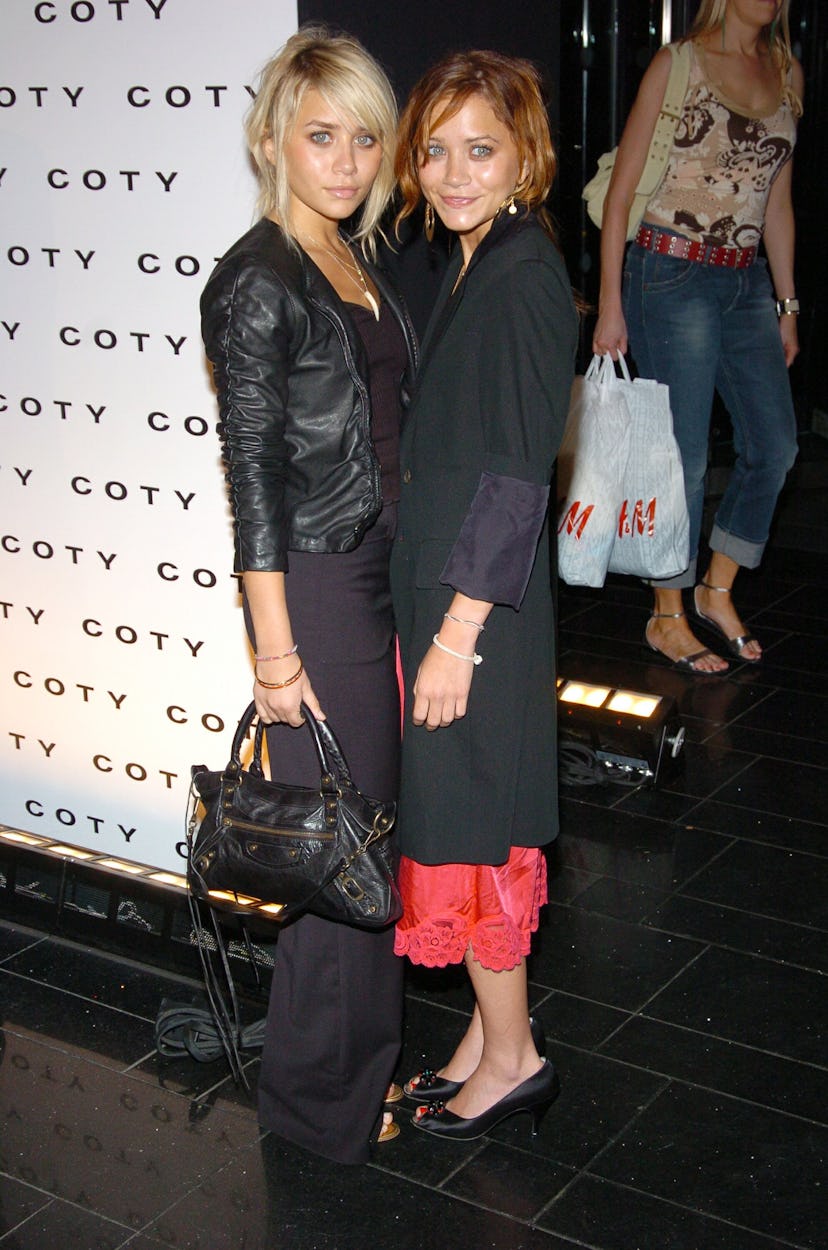 Ashley Olsen and Mary Kate Olsen at the The 100th Anniversary of Coty at American Museum of Natural ...