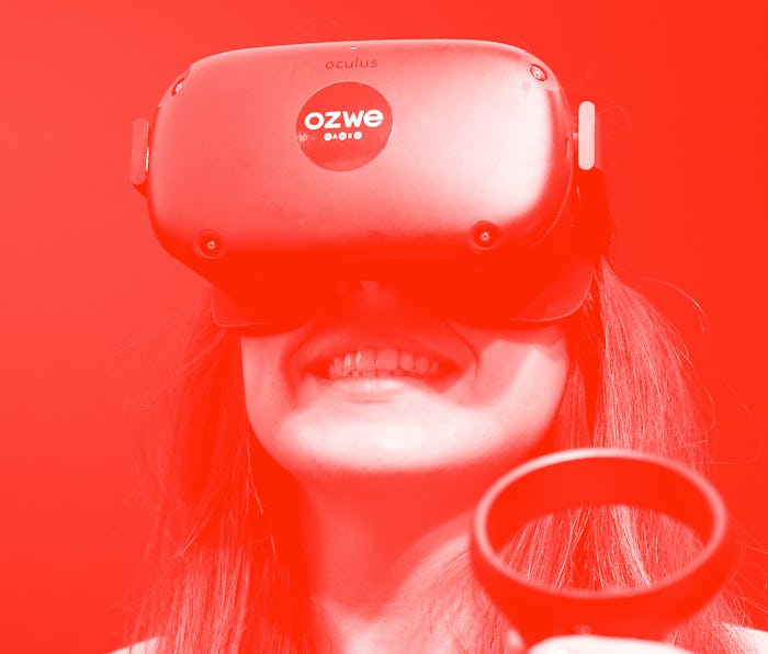 PARIS, FRANCE - NOVEMBER 21: A visitor tries a virtual reality helmet Oculus Quest during the Virtua...