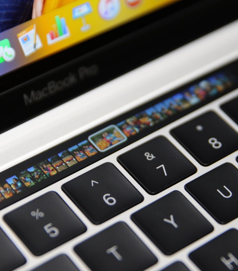 Mini versions of photos can be seen in the Photo app on a MacBook Pro in Cupertino, USA, 27 October ...