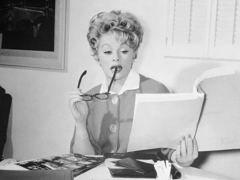 (Original Caption) It has been said that "It's a woman's world." Perhaps. Maybe even yes, considerin...