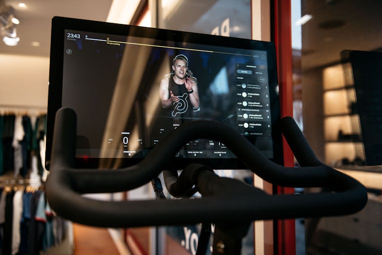 NEW YORK, NY - DECEMBER 04: An instructor is seen on the video display of a Peloton stationary bike ...