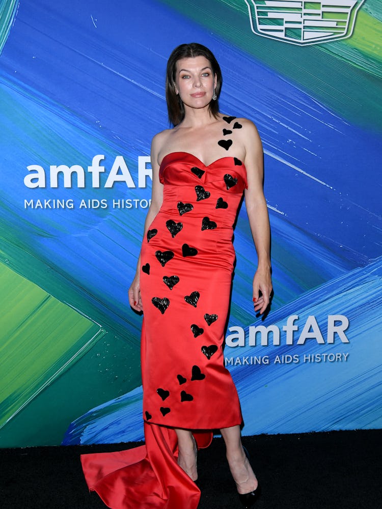 Milla Jovovich attends amfAR Gala Los Angeles 2021 