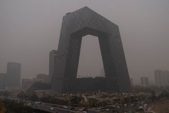 BEIJING, CHINA - NOVEMBER 05: The CCTV headquarters are seen on a highly polluted day on November 05...