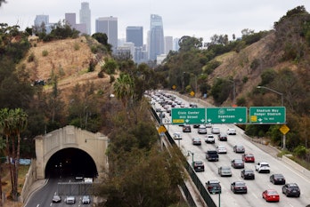 LOS ANGELES, CALIFORNIA - APRIL 22: Cars make their way toward downtown L.A. during the morning comm...