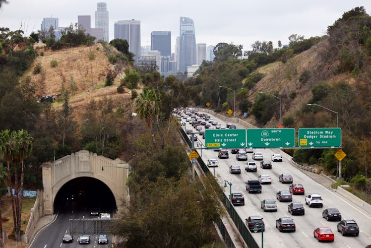 LOS ANGELES, CALIFORNIA - APRIL 22: Cars make their way toward downtown L.A. during the morning comm...