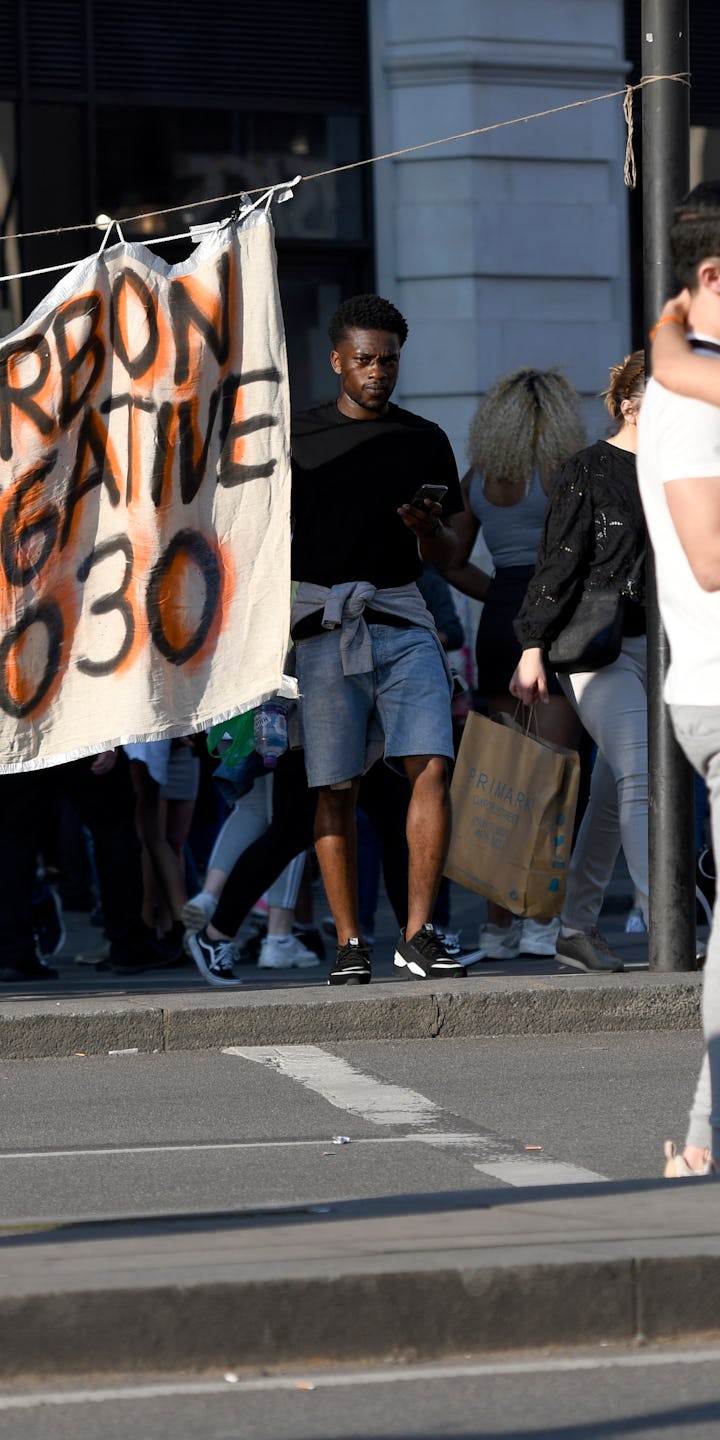 MARBLE ARCH, LONDON, GREATER LONDON, UNITED KINGDOM - 2019/04/20: A large Extinction Rebellion banne...