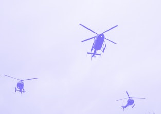 HAMPTON BAYS, NY - FEBRUARY 20: Helicopters perform a flyover following the funeral of NYPD Detectiv...