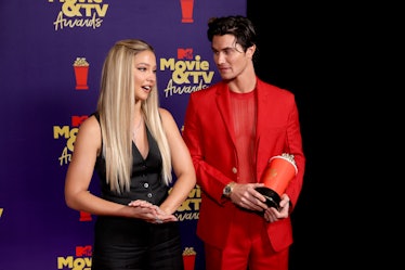 Madelyn Cline and Chase Stokes attend the 2021 MTV Movie and TV Awards together, months before Stoke...