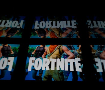 This illustration picture shows the video game Fortnite logo displayed on a tablet in Paris, on Febr...