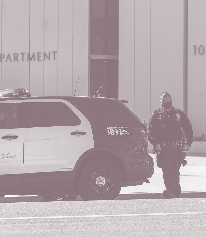 LOS ANGELES, CA - OCTOBER 14, 2021: A member of the LAPD leaves their headquarters on 1st St. in dow...