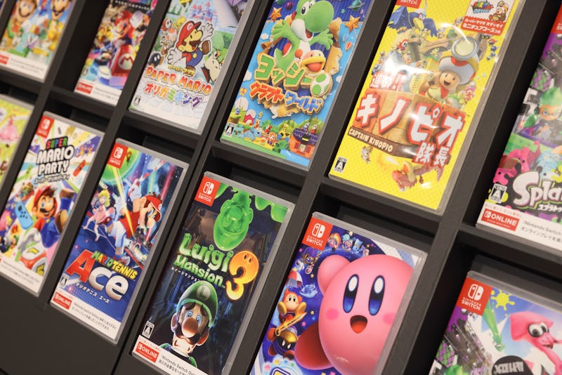 Nintendo Switch video games on display inside Nintendo Tokyo store in Shibuya.
