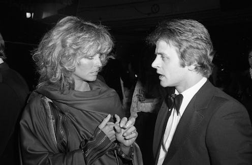 American film star Farrah Fawcett talks to Russian ballet dancer Mikhail Baryshnikov at disco nightc...