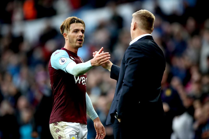 Aston Villa's Jack Grealish with manager Dean Smith after the final whistle during the Premier Leagu...