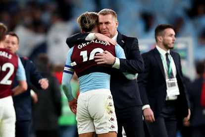 LONDON, ENGLAND - MARCH 01:  A dejected Jack Grealish of Aston Villa with Aston Villa manager Dean S...