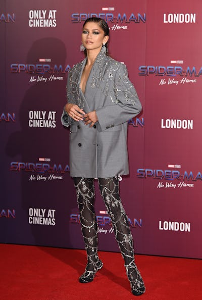 Zendaya wears an oversized blazer and boots for "Spiderman: No Way Home" on December 05, 2021.