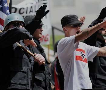 Members of the neo-nazi group, The American National Socialist Movement, protest during a rally in f...