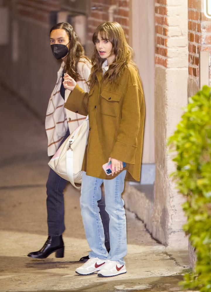 Lily Collins wears Mango brown shacket in 2021.