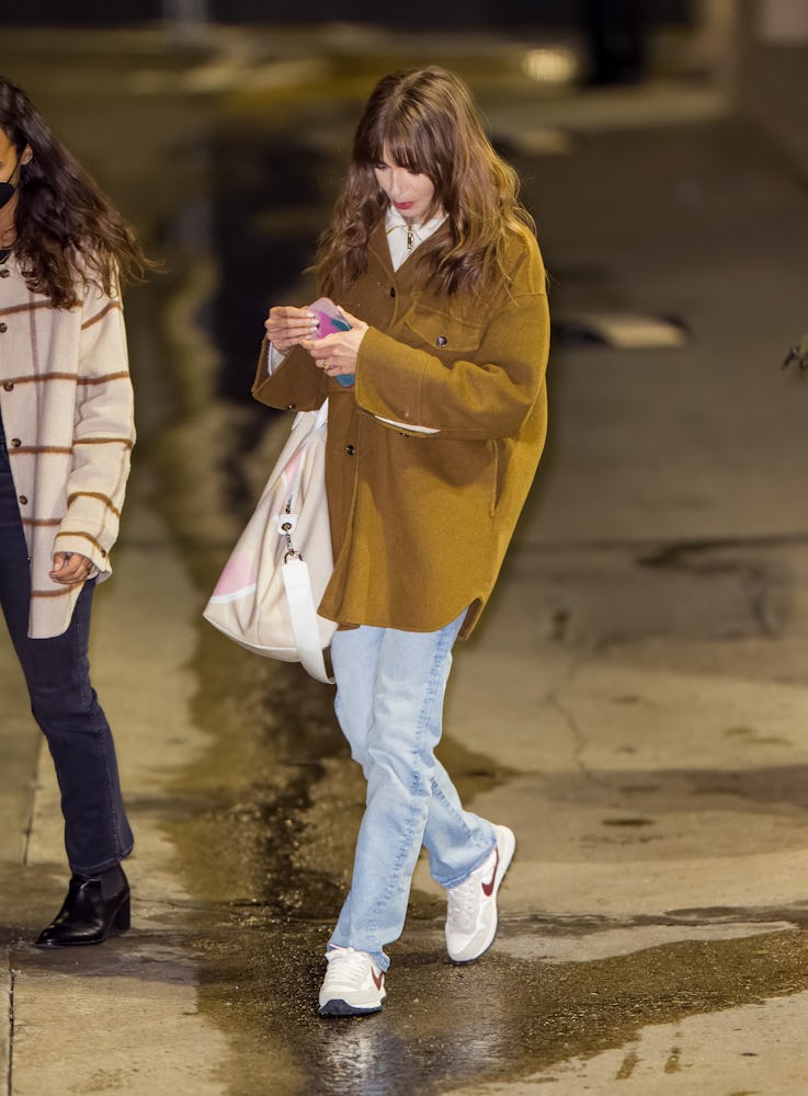 Lily Collins wears Mango brown shacket in 2021.