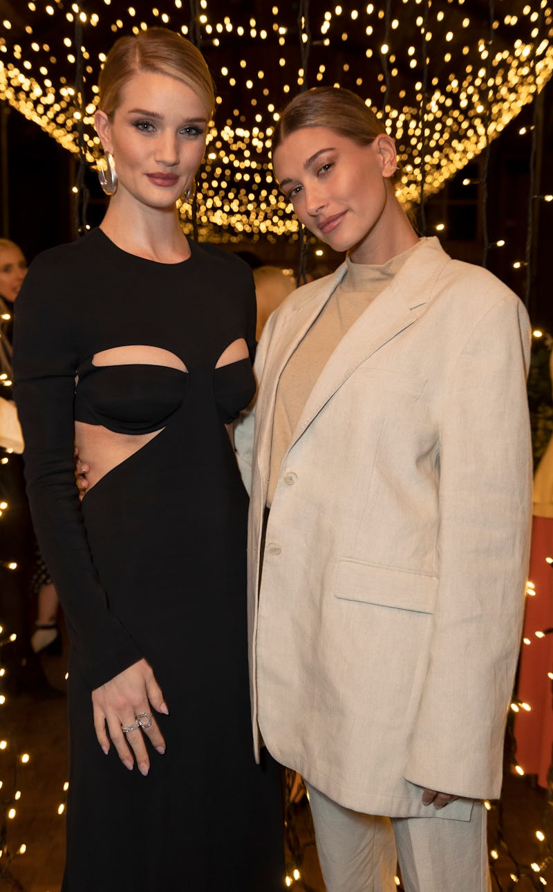 CHIPPING NORTON, ENGLAND - NOVEMBER 08: Rosie Huntington-Whiteley and Hailey Rhode Baldwin attend ...