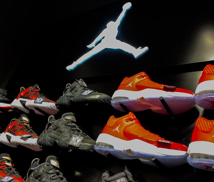 Air Jordan logo is seen in a shoe store in Krakow, Poland on August 26, 2021. (Photo by Jakub Porzyc...