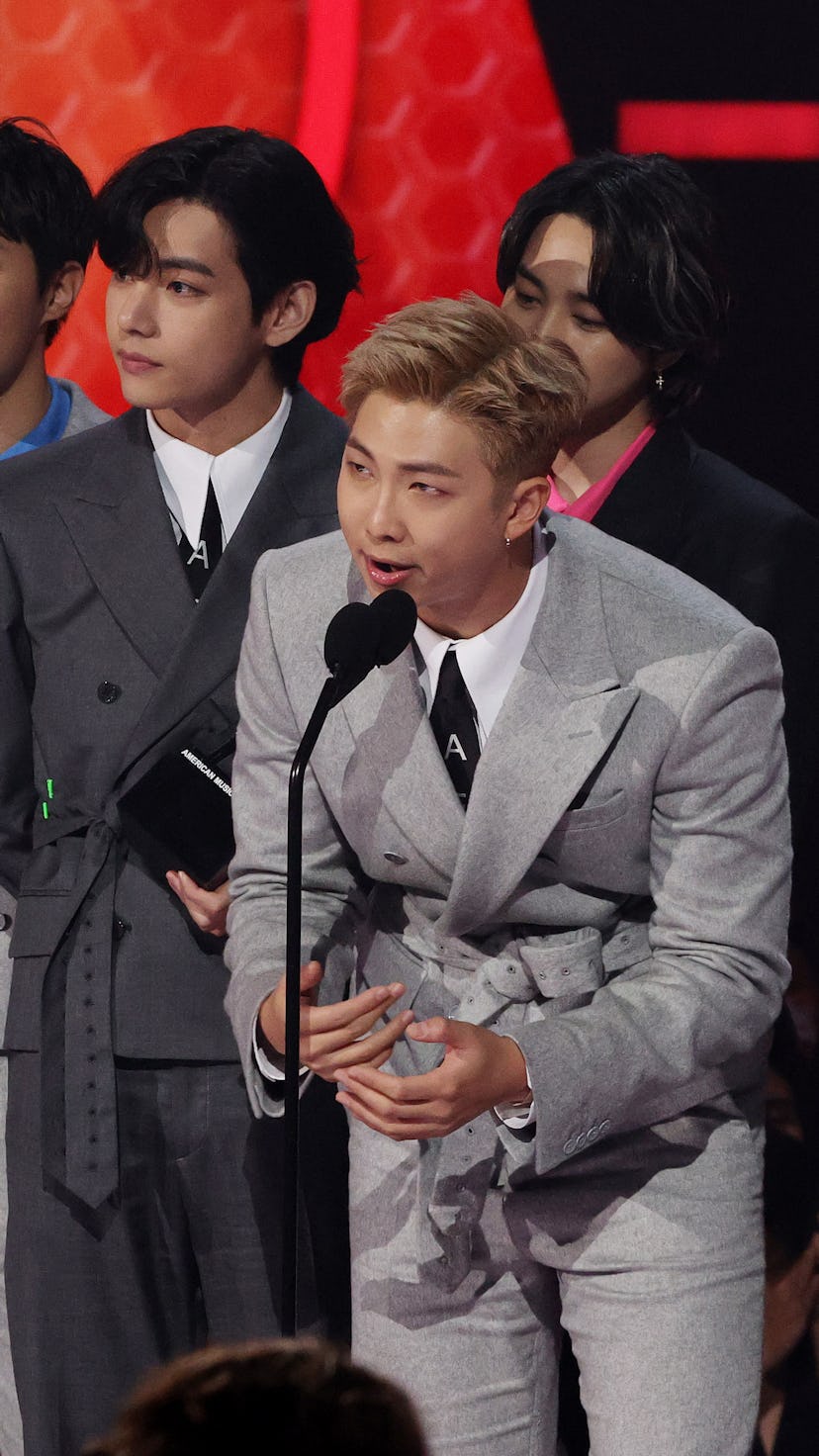 J-Hope, V, RM, Jimin, Suga, and Jungkook of BTS.