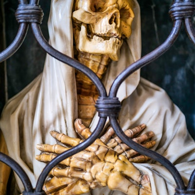 Rome, Italy, May 10 -- An impressive figure of the death in a grave inside the church of Santa Maria...