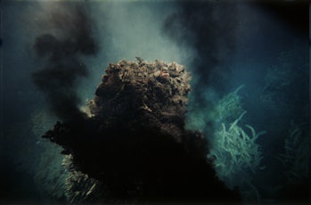 A tubular hydrothermal vent that releases hot water, known as a "black smoker", in the Pacific Ocean...