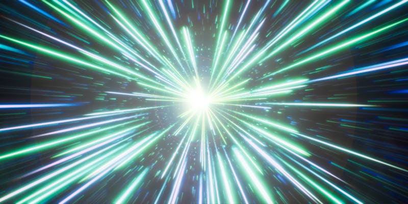 A warp bubble with green and blue beaming lights coming from the central point