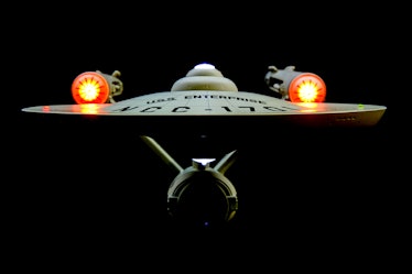 A model of the Federation starship USS Enterprise, commanded by Captain James T. Kirk in the origina...