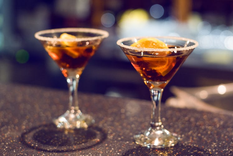 A version of an old fashioned is one of the warm holiday alcoholic drinks.
