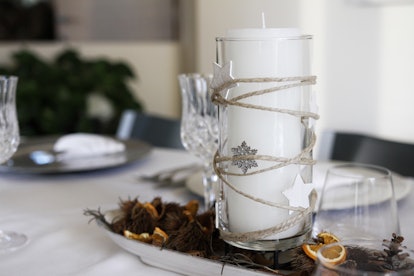 One idea for winter solstice decorations is a gorgeous candle centerpiece.