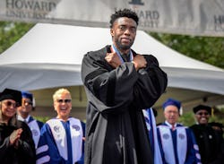 WASHINGTON, DC - MAY 12:
Actor Chadwick Boseman gives a Wakanda salute to the crowd as Howard Univer...