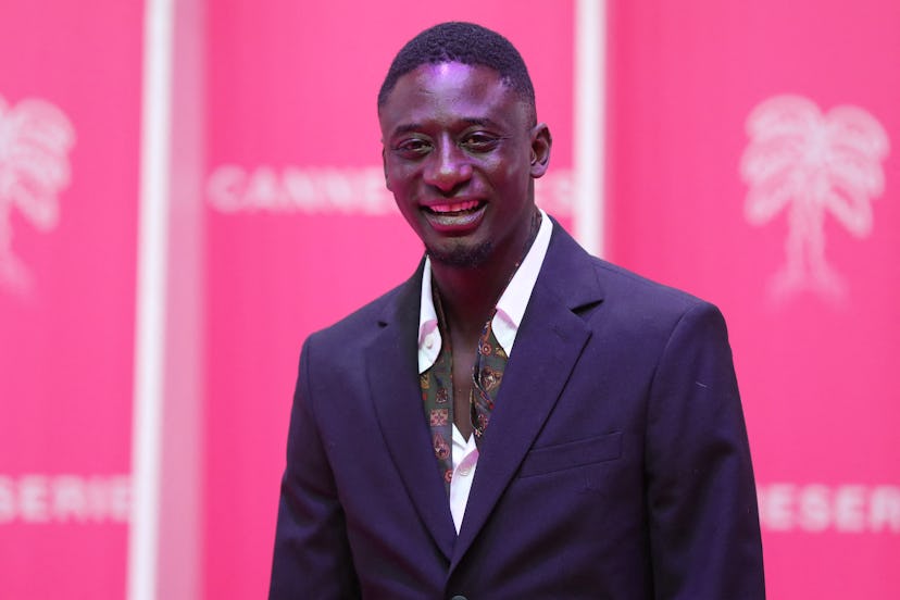 French actor Ibrahim Koma poses during the "Le tour du monde en 80 jours" red carpet as part of the ...