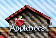 Applebee's restaurant logo on wall above entrance, northern Idaho. (Photo by: Don & Melinda Crawford...