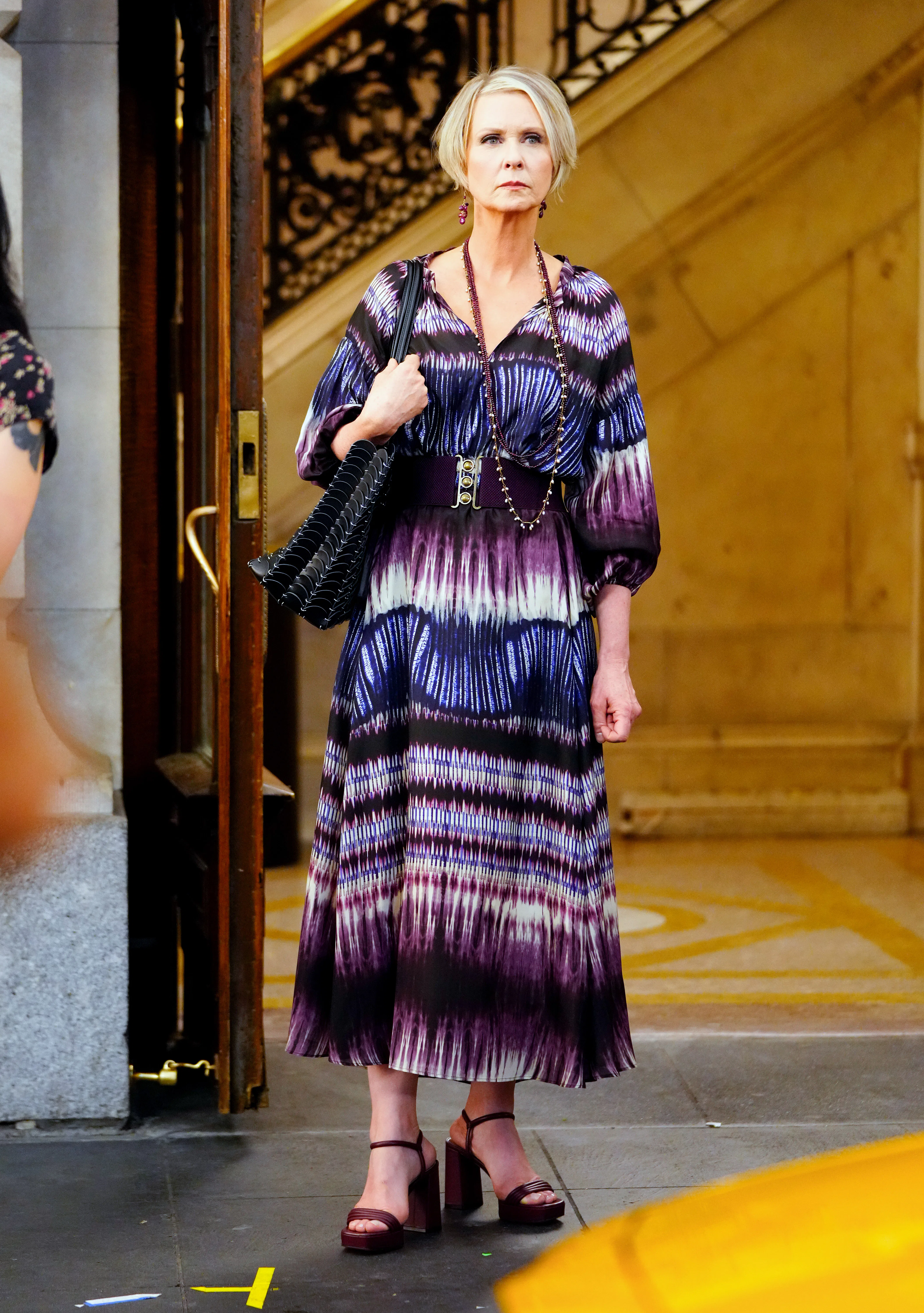 miranda purple dress and just like that SILK BLACK AND PURPLE SPOTTED DRESS BY ESCADA -Season 6, Ep. 8 Miranda:  That Debbie is crazy! She came to my apartment with Steve, totally ambushed  me! I had to hide under