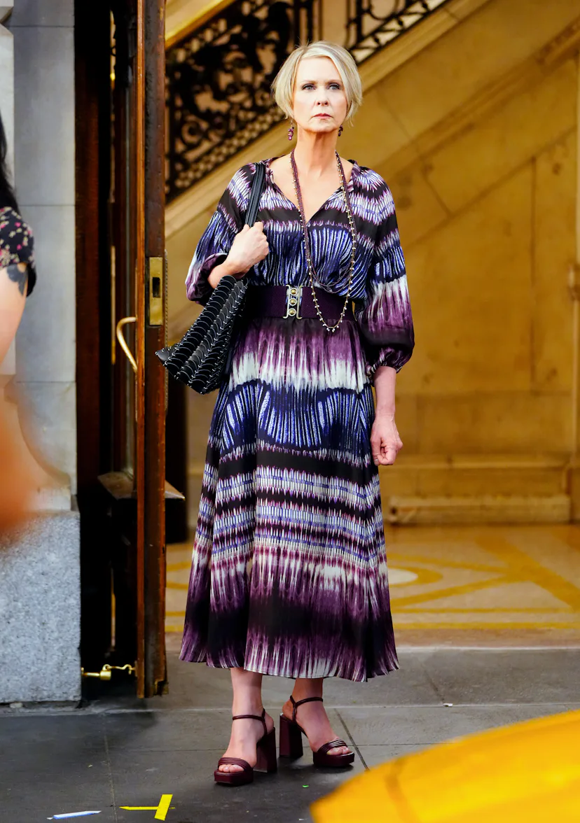 miranda purple dress and just like that SILK BLACK AND PURPLE SPOTTED DRESS BY ESCADA -Season 6, Ep. 8 Miranda: That Debbie is crazy! She came to my apartment with Steve, totally ambushed me! I had to hide under