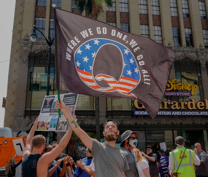 Conspiracy theorist QAnon demonstrators protest child trafficking on Hollywood Boulevard in Los Ange...