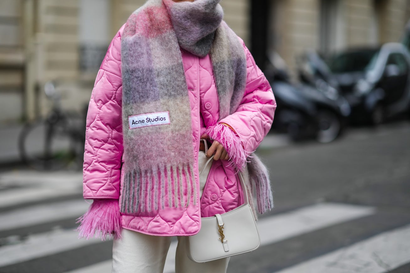 PARIS, FRANCE - NOVEMBER 20: Katie Giorgadze @katie.one wears a pink knitted mohair sweater with fea...