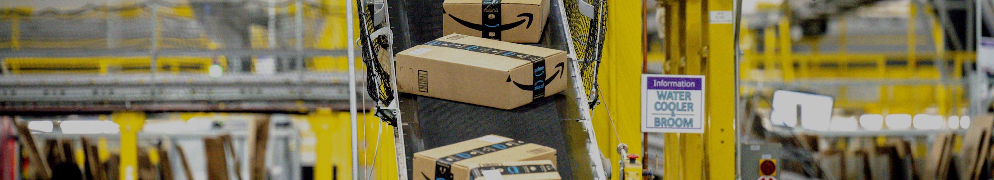 EASTVALE, CA - AUGUST 31: Packages move along a conveyor at Amazon fulfillment center in Eastvale on...